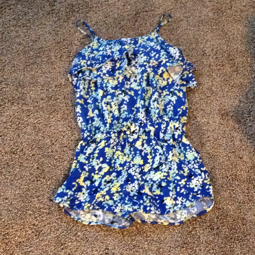 Blue ruffle spaghetti strap romper.